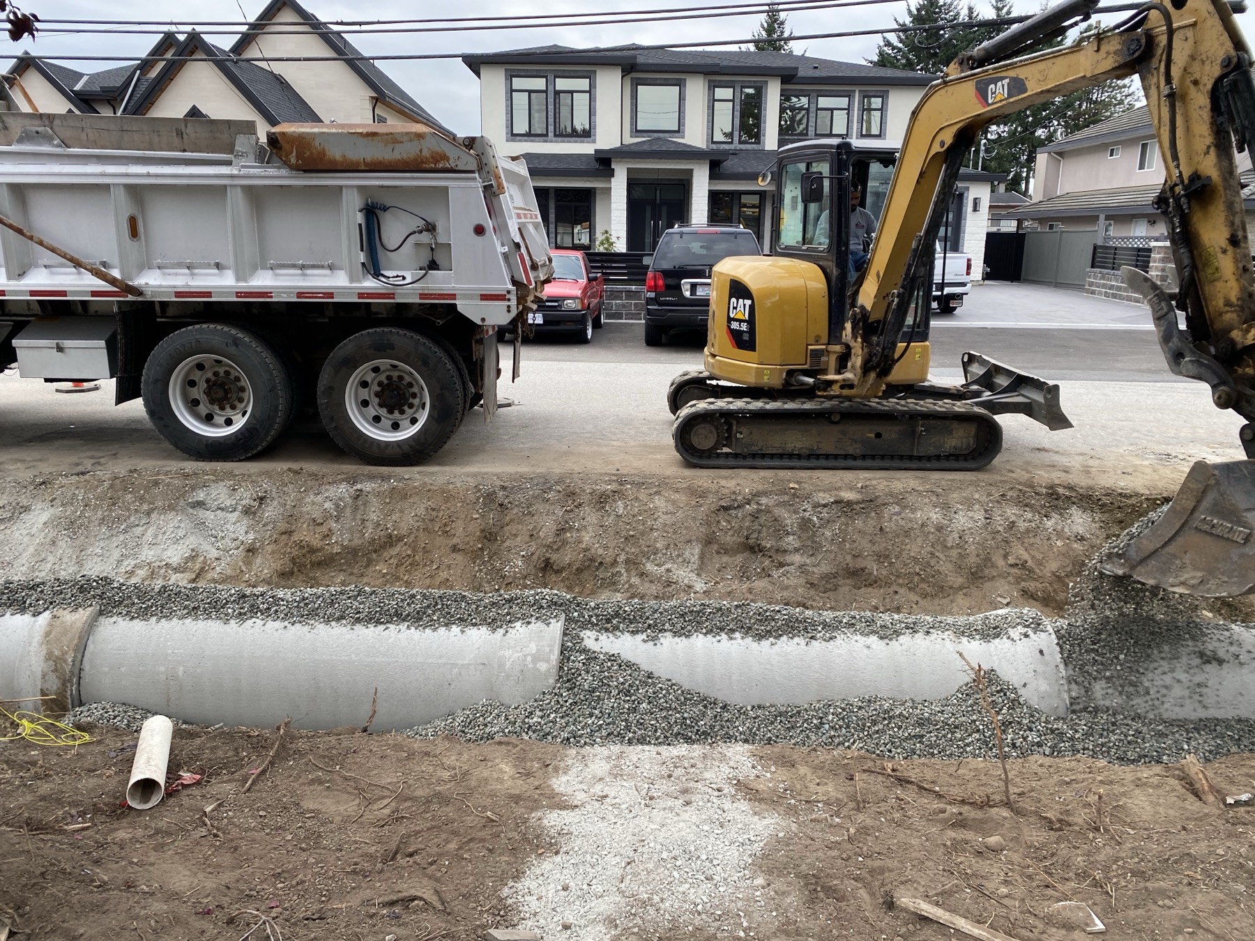 Street works with pipe and machines